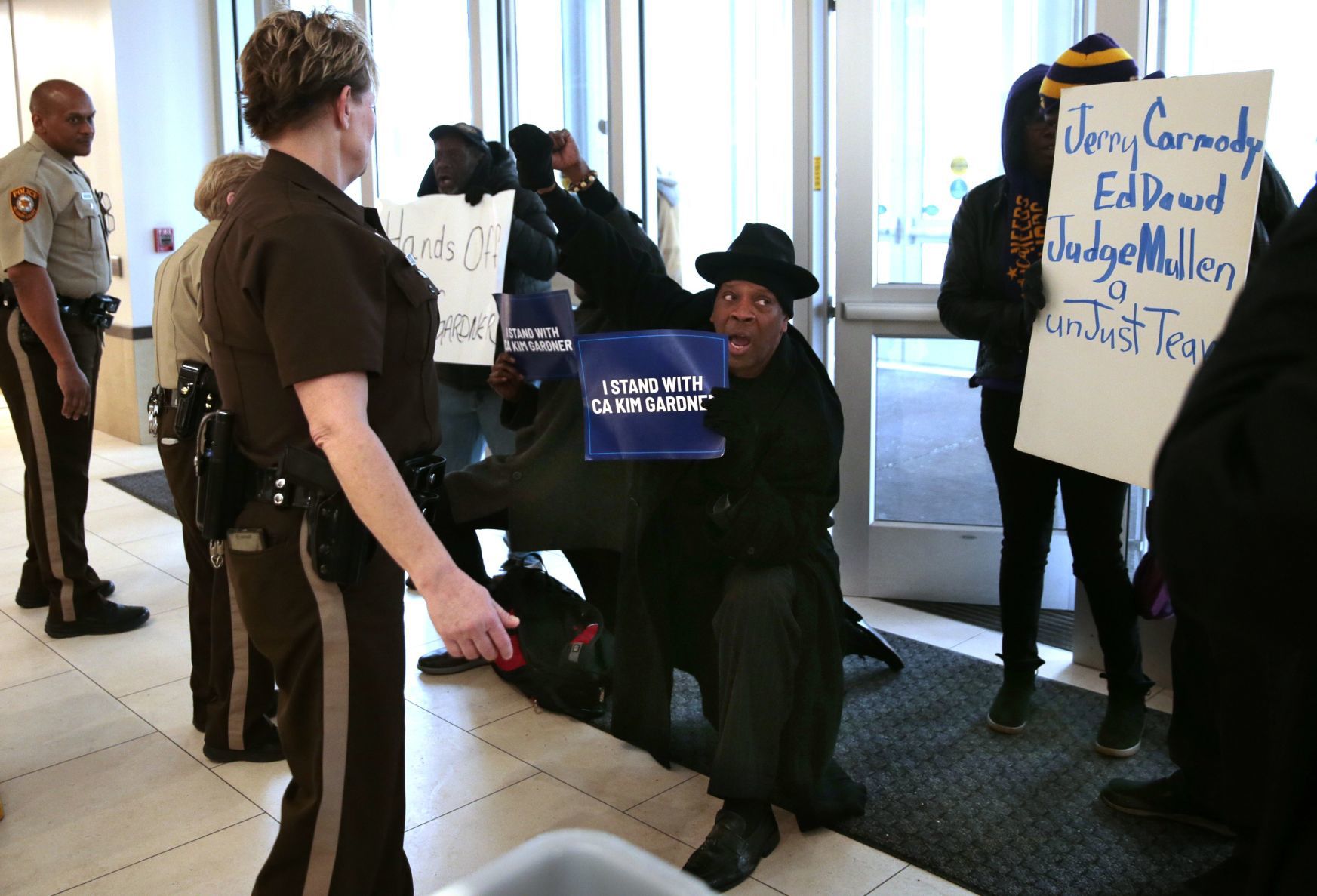 Protesters march in Clayton as St. Louis circuit attorney arrives for deposition